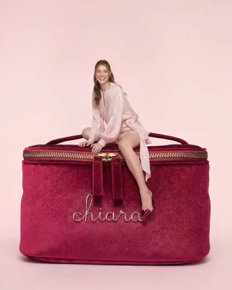 Model sitting on oversized Chiara bag