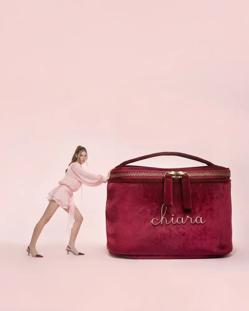 Model pushing oversized Chiara bag